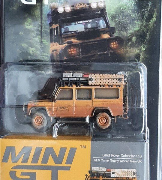 MODELO ESCALA 1/64  Land Rover Defender 110 1989 Camel Trophy Winner