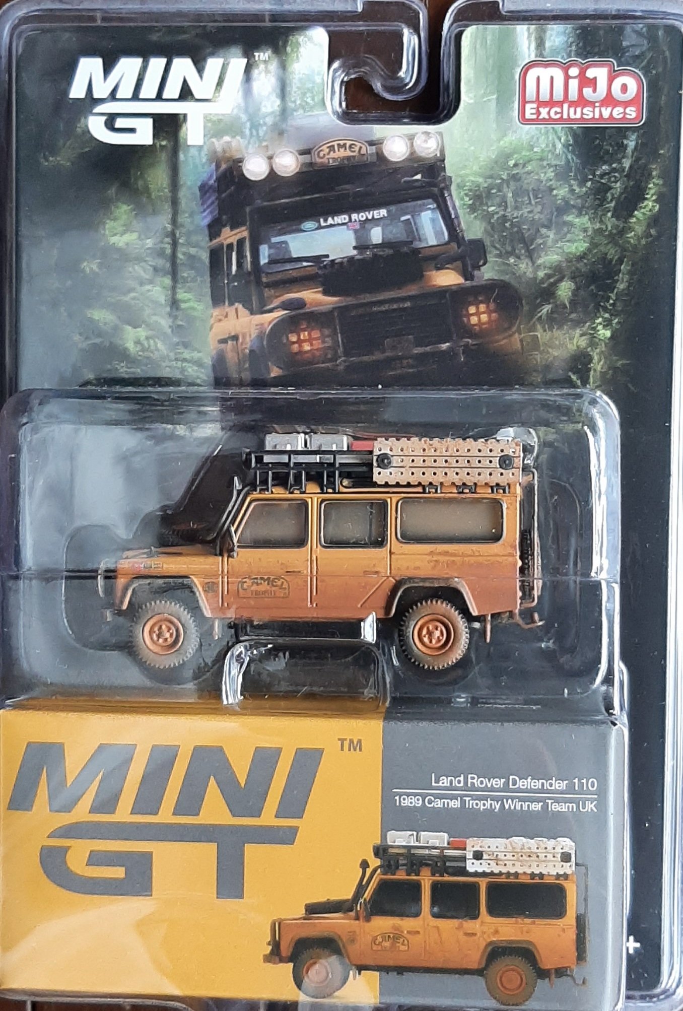 MODELO ESCALA 1/64  Land Rover Defender 110 1989 Camel Trophy Winner