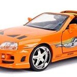 MODELO ESCALA 1:24 Hollywood Ride - The Fast & Furious - Toyota Supra W/ Brian O'Cornner Orange CON FIGURA