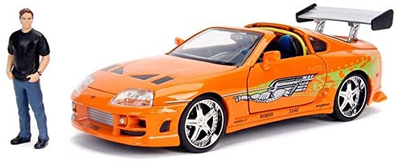 MODELO ESCALA 1:24 Hollywood Ride - The Fast & Furious - Toyota Supra W/ Brian O'Cornner Orange CON FIGURA