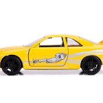 MODELO ESCALA 1/32 Leon's Nissan Skyline GT-R (BCNR33), Yellow - Jada Toys- RAPIDO Y FURIOSO Diecast Model