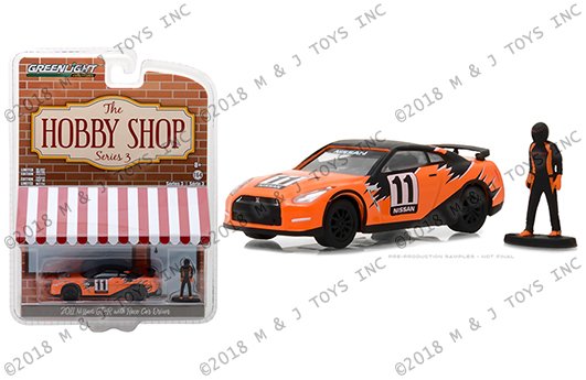 MODELO ESCALA 1:64 The Hobby Shop Series 3 – 2011 Nissan SKYLINE GT-R (R35) with Driver (orange)