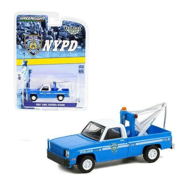 MODELO ESCALA 1:64 1987 GMC Sierra K2500 w Drop in Tow Hook - NYPD (Blue)