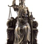 LADY JUSTICE SITTING WITH SCALES AND SWORD - DAMA DE JUSTICIA CON ESCALA Y ESPADA