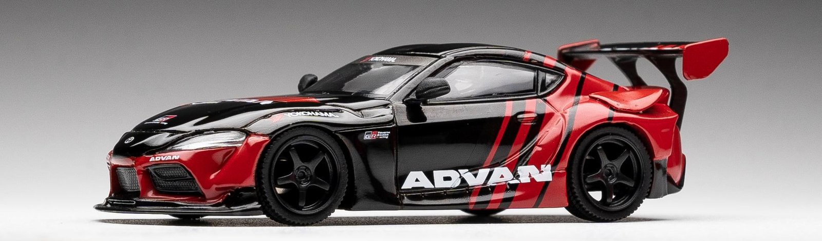 MODELO ESCALA 1/64 ADVAN GR TOYOTA SUPRA MINIGT